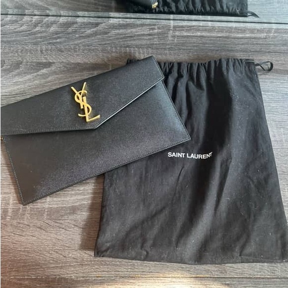 Saint Laurent Handbags - Saint Laurent UPTOWN POUCH IN GRAIN DE POUDRE LEATHER
BLACK